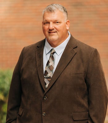 Portrait of Dennis Gibson, REALTOR®.