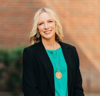 Portrait of Michelle Haag, Broker & Owner